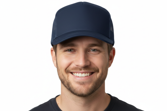 create an image of a white male smiling wearing a Richardson 5 Panel Seamless Front Trucker Twill Mesh Snapback Hat in Navy Blue with no background